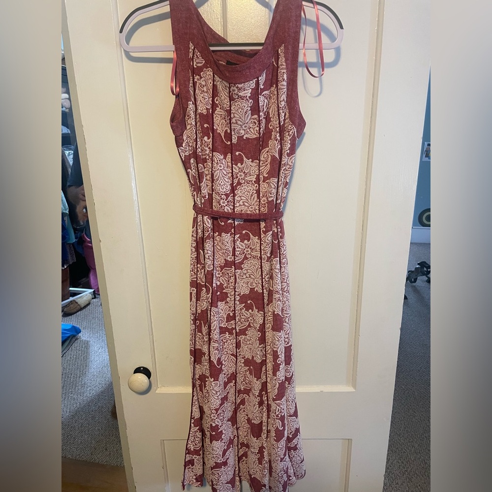 Pinkish red dress with floral design